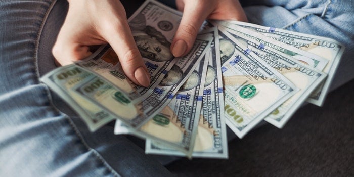 a person counting money