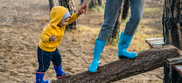 Person holding hand of a child
