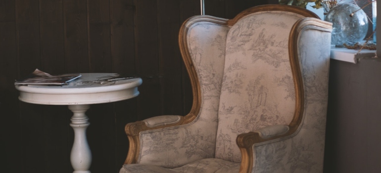 an antique armchair is Furniture Worth Moving From San Clemente to Anaheim
