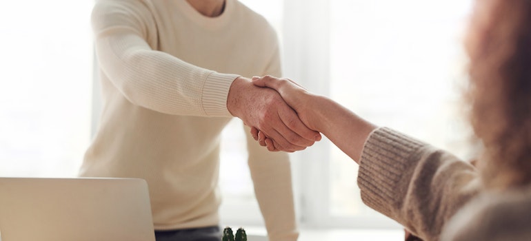 Man and Woman shacking hands