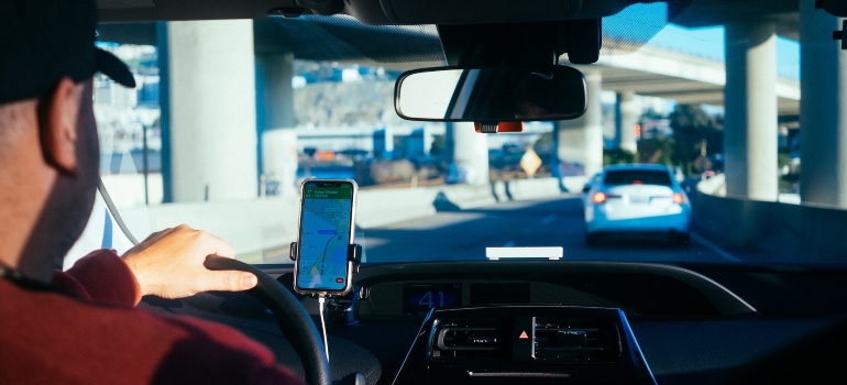Picture of a person driving a car