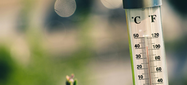 a thermometer indicating high temperature which is why you may need climate controlled storage