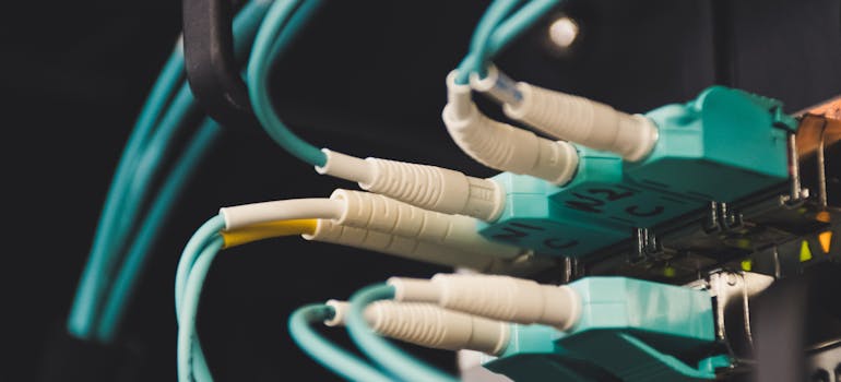 a bunch of blue cables connected to a device